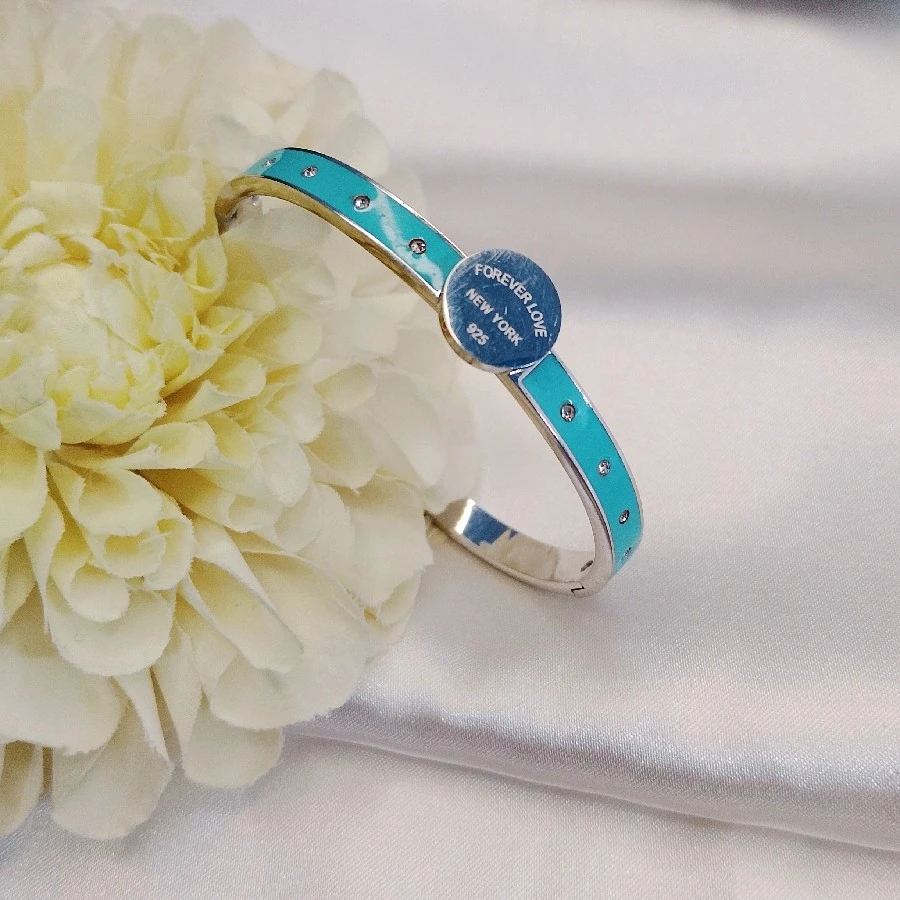 ÇELİK GÜMÜŞ RENGİ MARKA YEŞİL  KARARMAZ PASLANMAZ  19 CM KELEPÇE