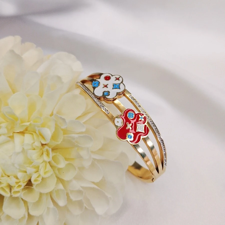 ÇELİK GOLD KARARMAZ PASLANMAZ TAŞLI MİNELİ  19 CM KELEPÇE