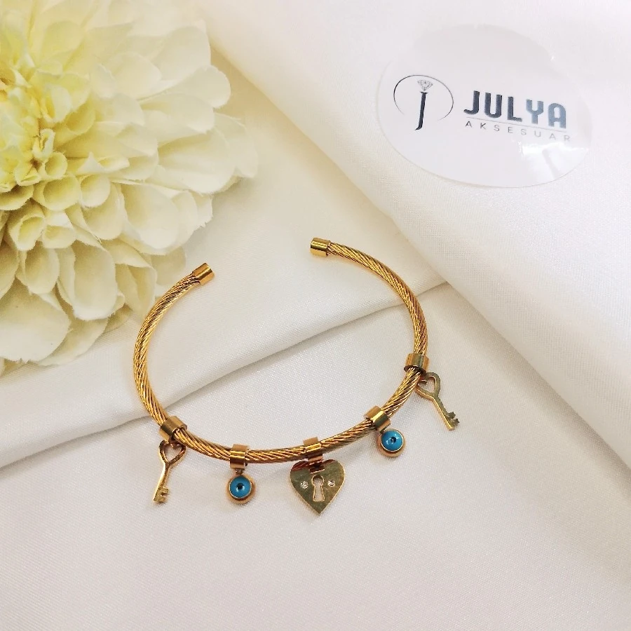 ÇELİK GOLD KARARMAZ PASLANMAZ  ANAAHTARLI   NAZAR BONCUKLU  AYARLANABİLİR BİLEKLİK