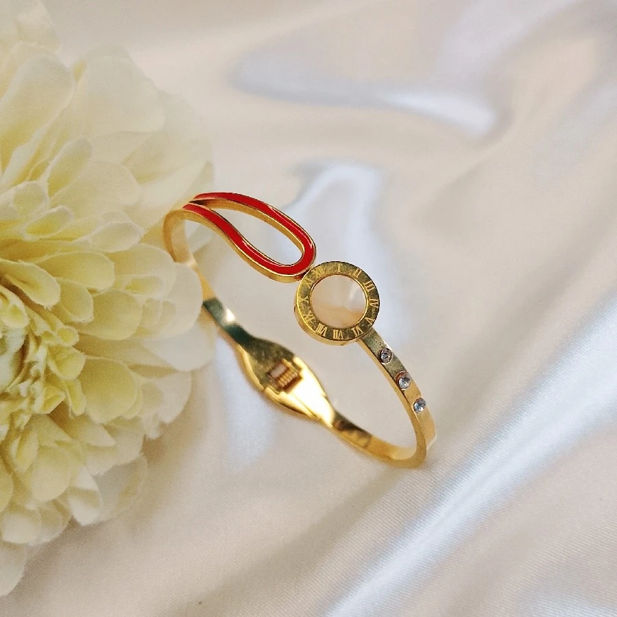 ÇELİK GOLD KARARMAZ PASLANMAZ TAŞLI RENKLİ SEDEFLİ 19 CM KELEPÇE