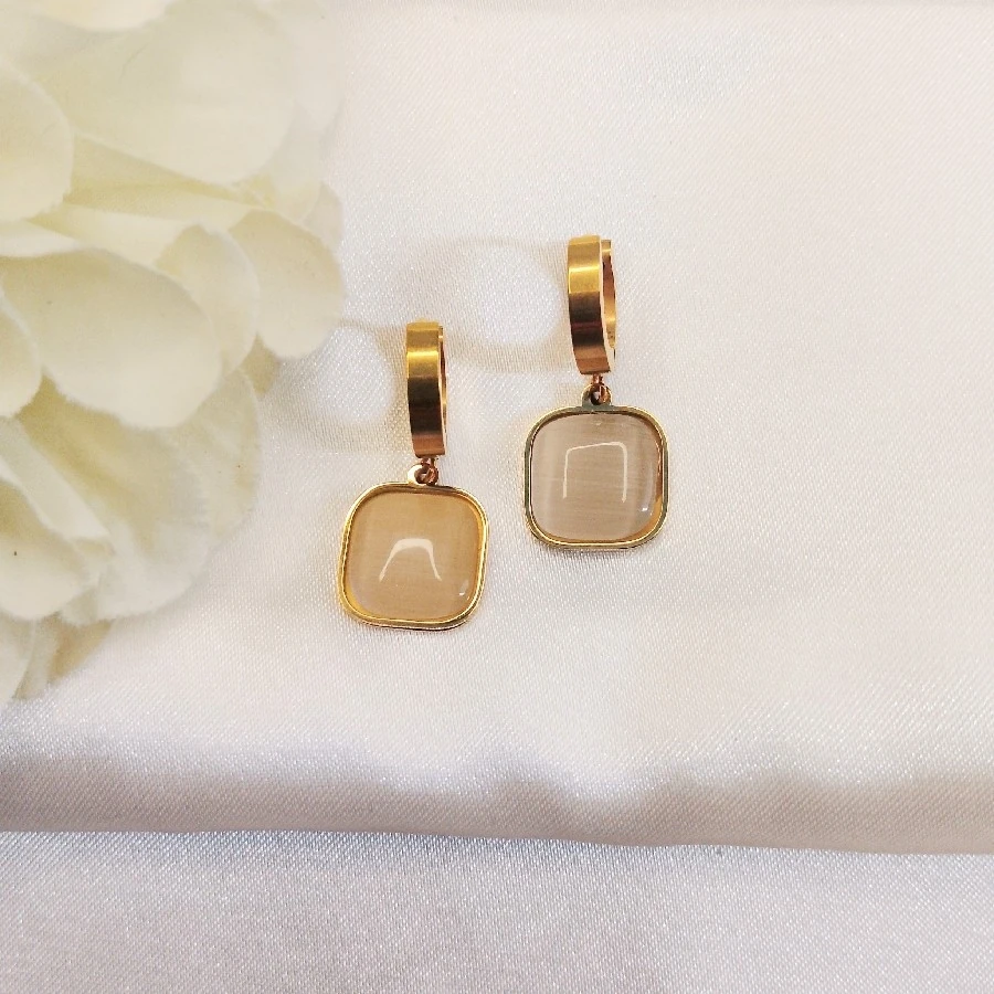 ÇELİK GOLD SEDEFLİ SALLANTILI KARARMAZ PASLANMAZ KÜPE