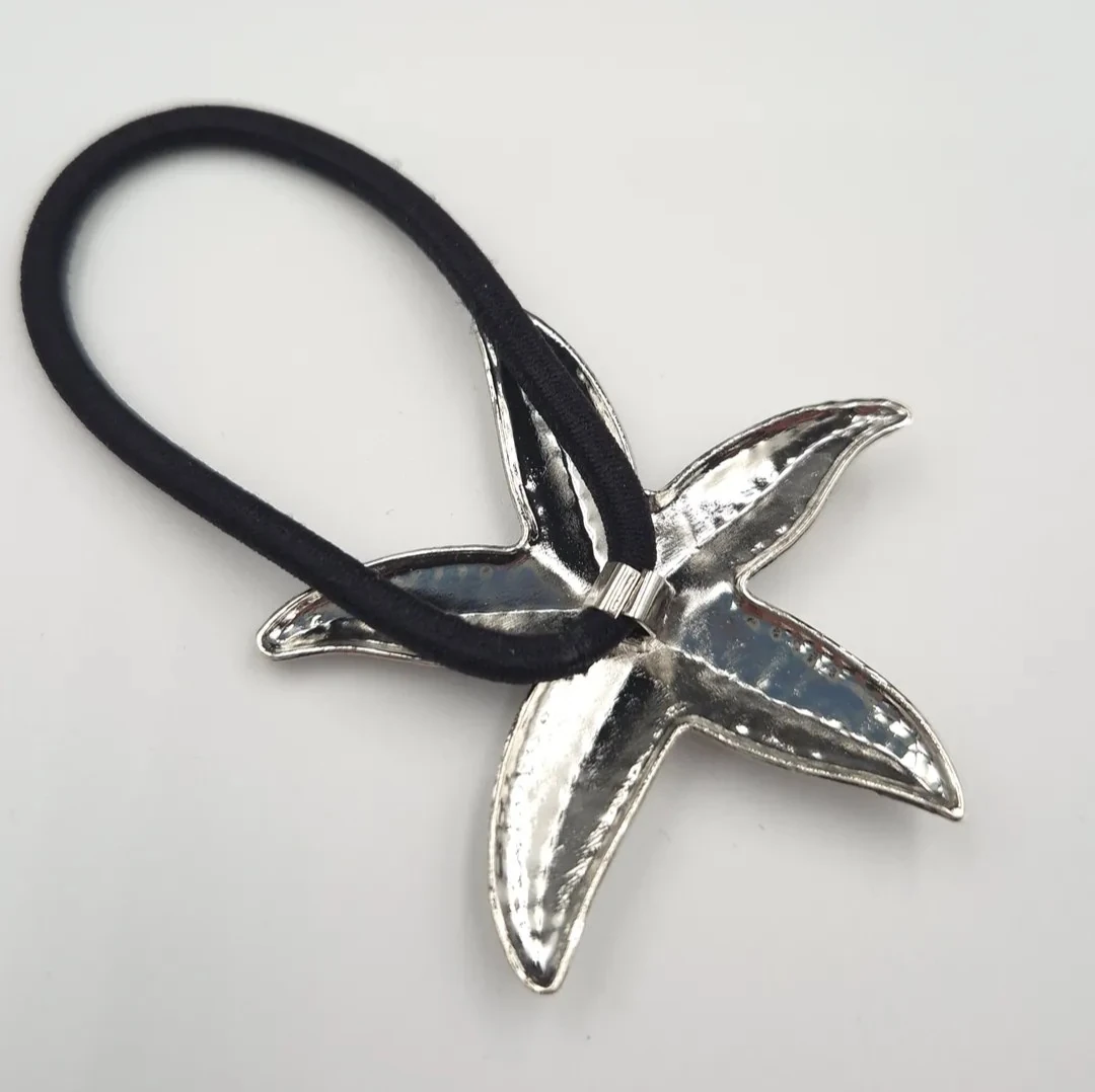 Kıyı Işıltısı Lastik Toka