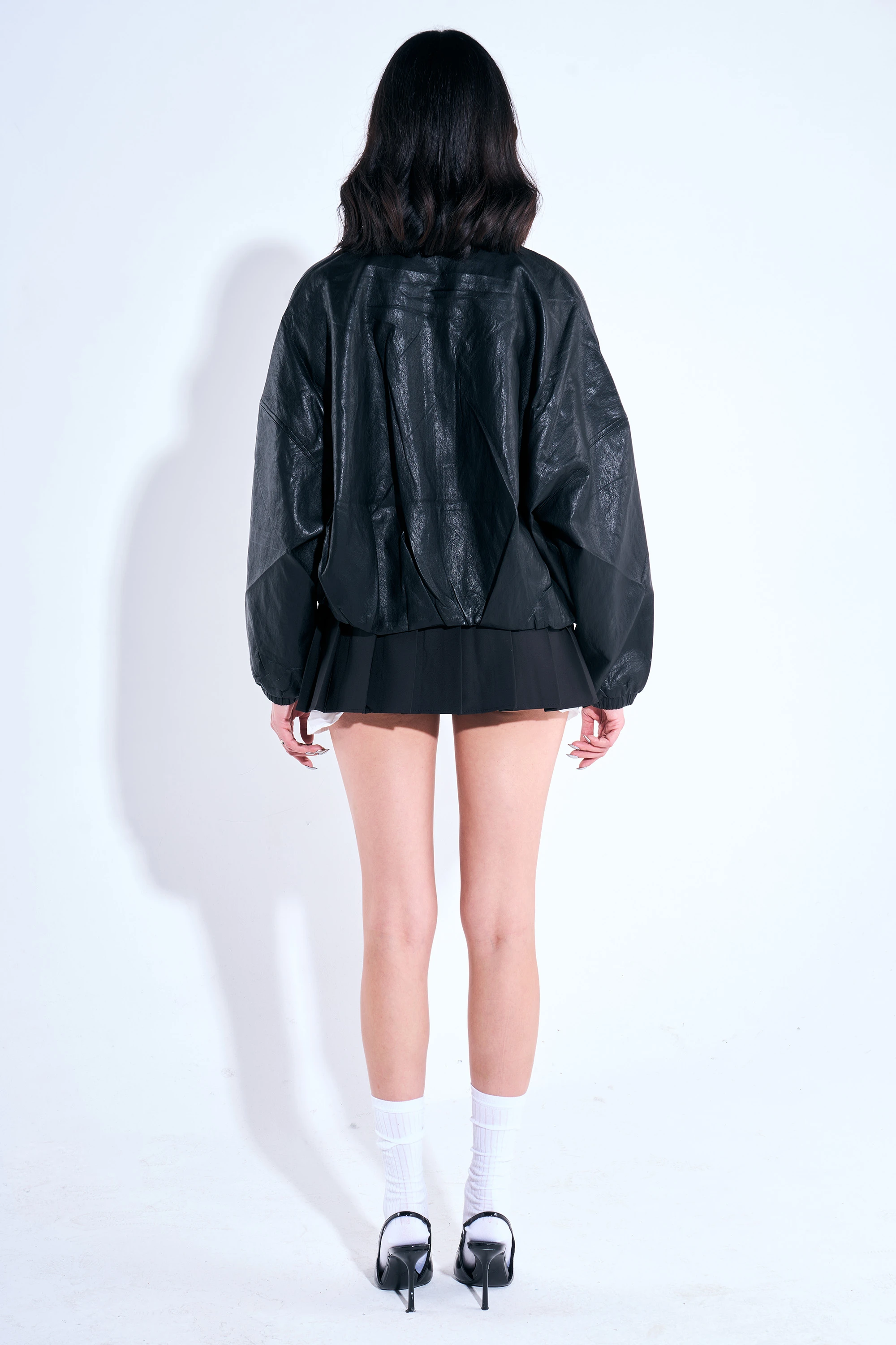 Beli Pileli Kolları Lastik Detaylı Deri Ceket