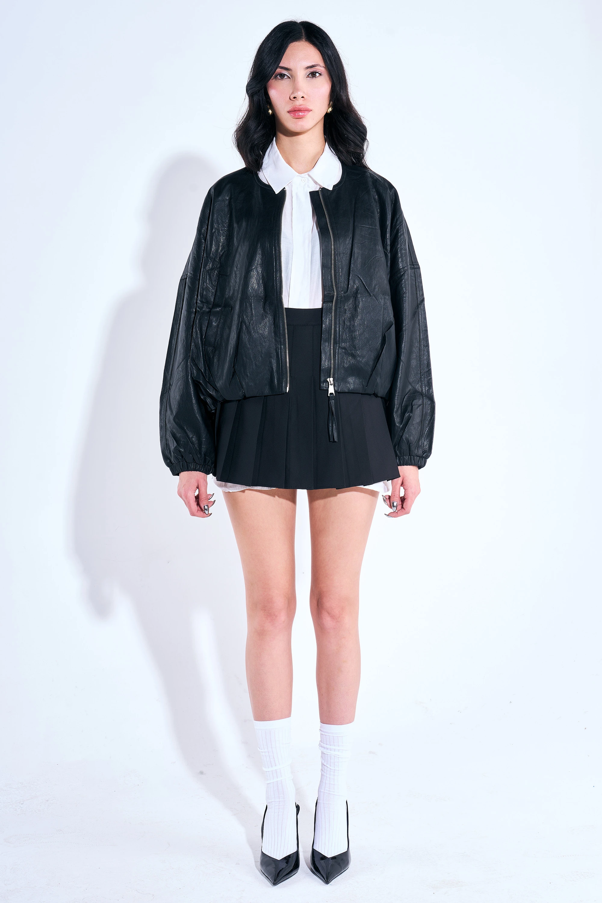 Beli Pileli Kolları Lastik Detaylı Deri Ceket