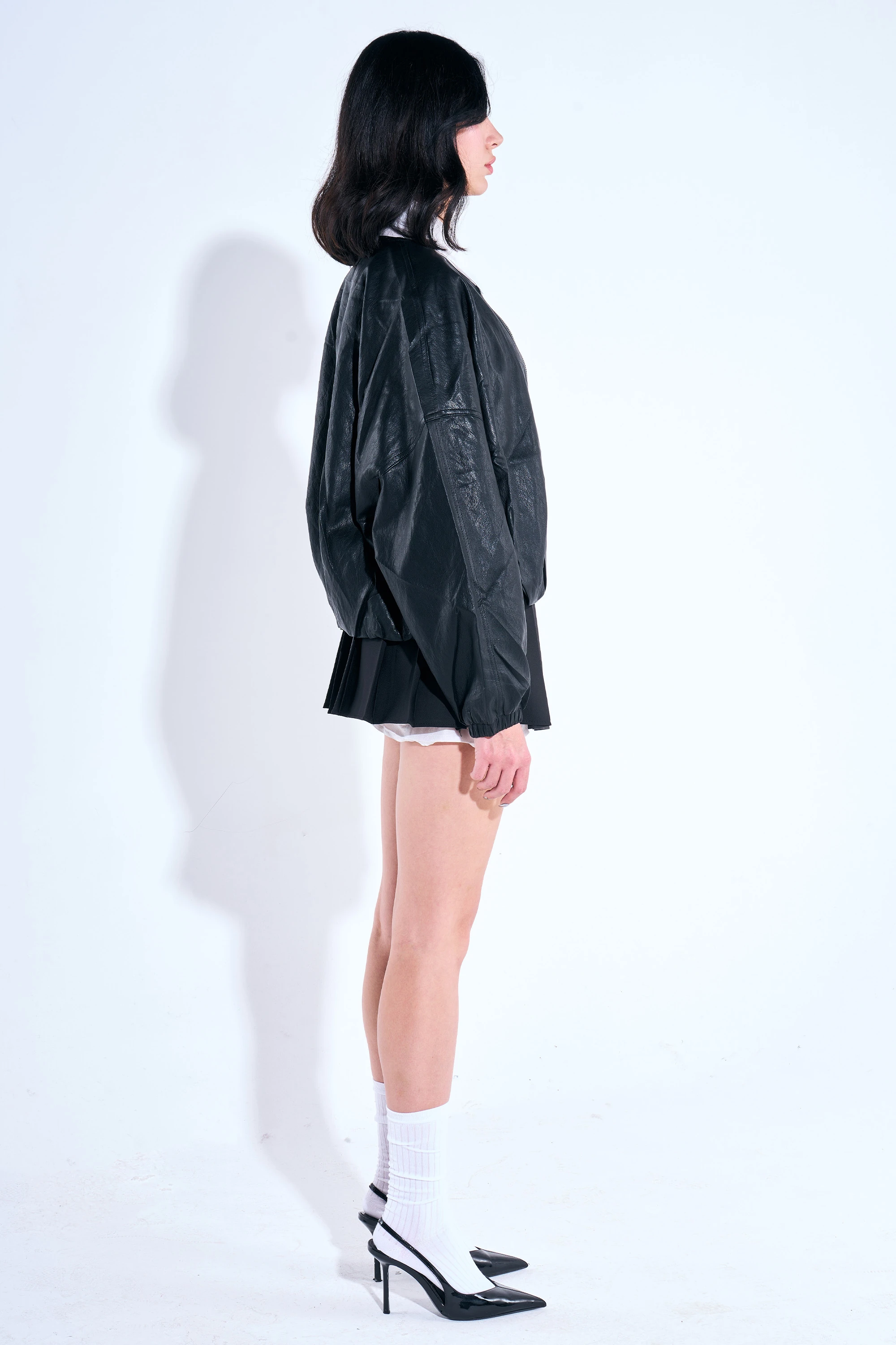 Beli Pileli Kolları Lastik Detaylı Deri Ceket