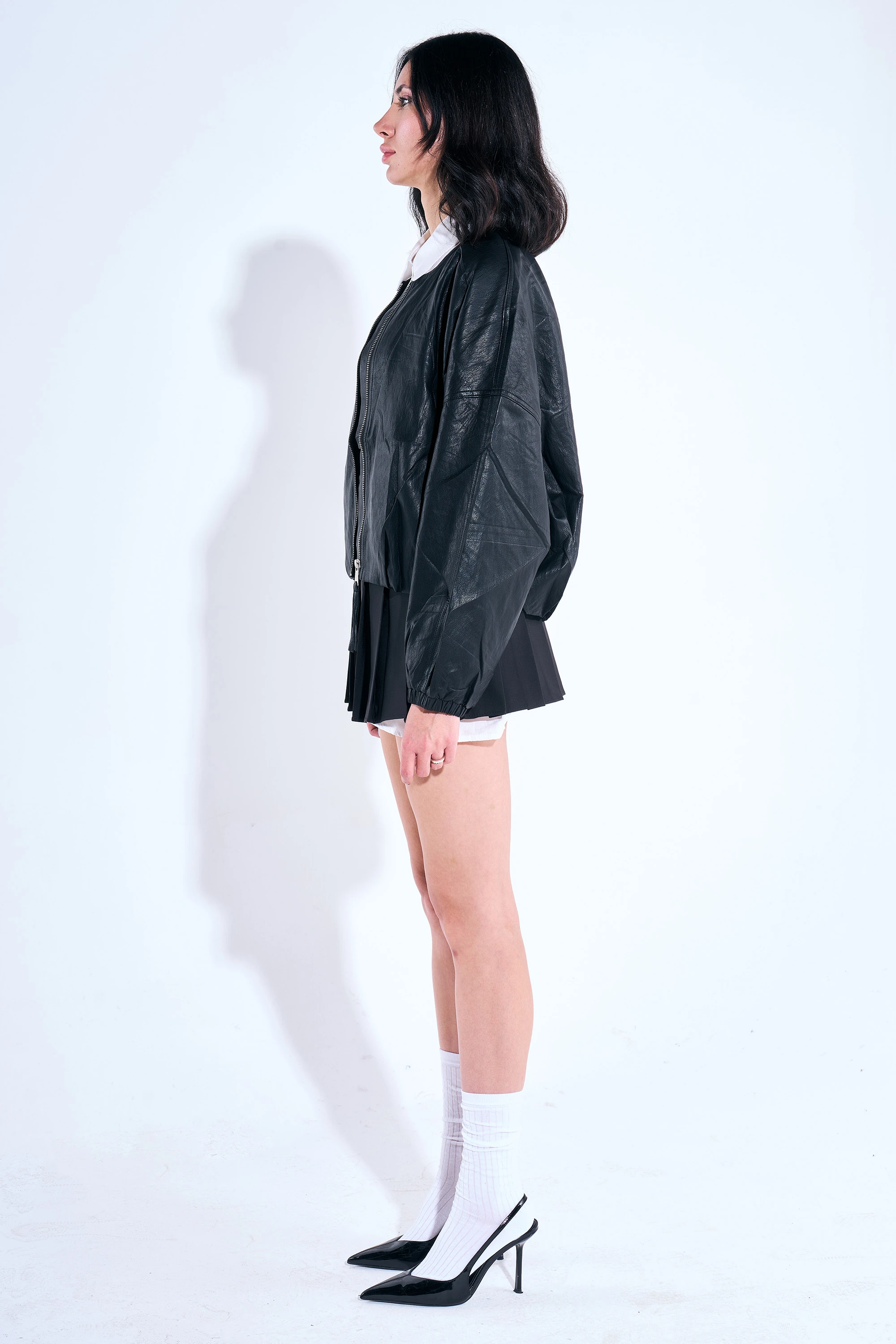 Beli Pileli Kolları Lastik Detaylı Deri Ceket