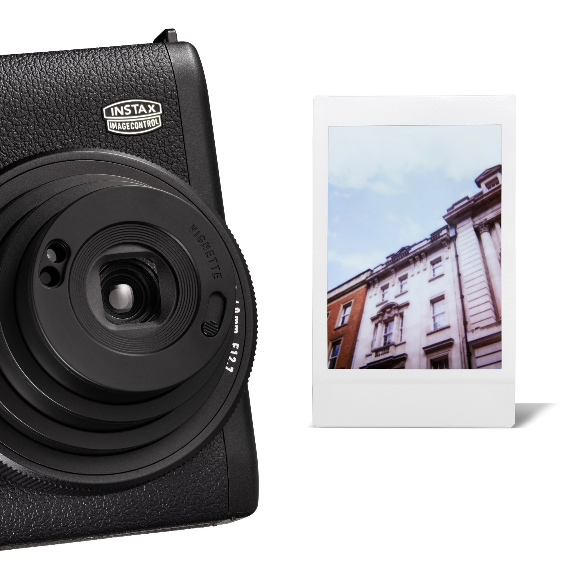 Instax Mini 99 Siyah Fotoğraf Makinesi ve 20'li Film