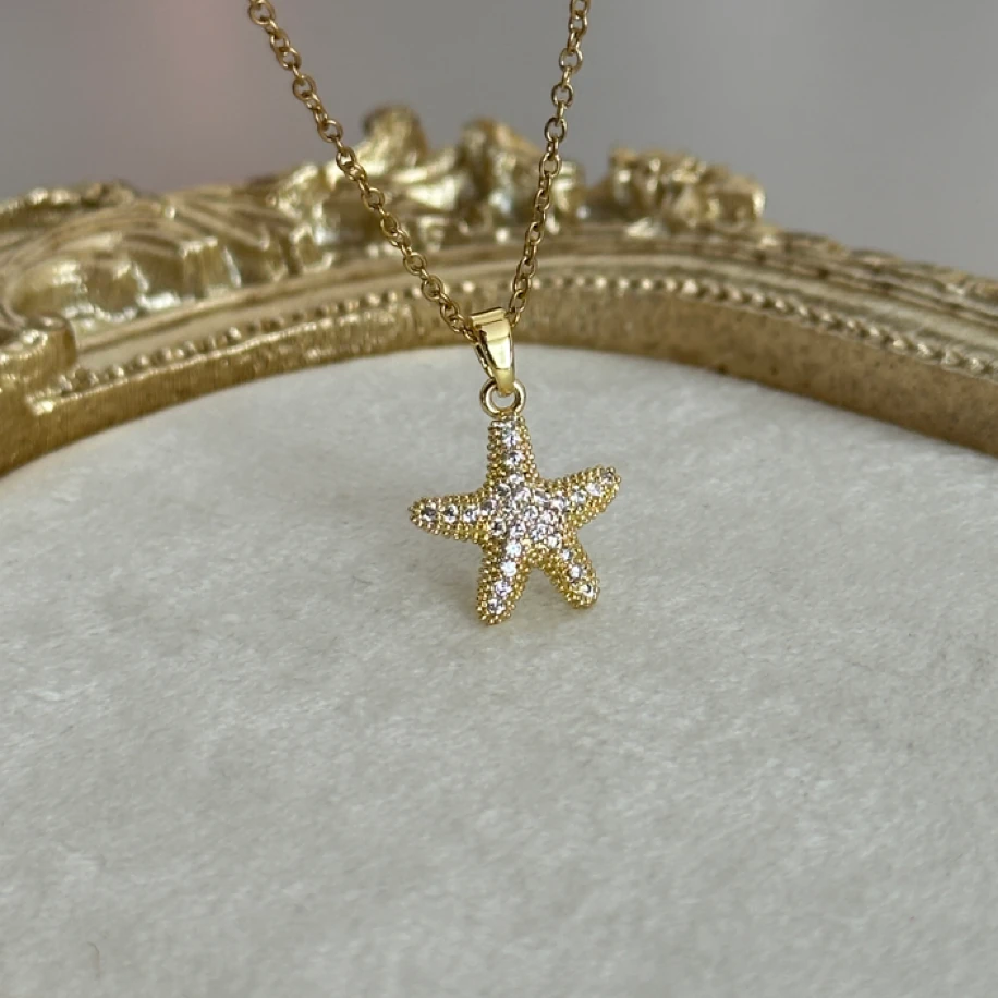 deniz yıldızı gold kolye | çelik