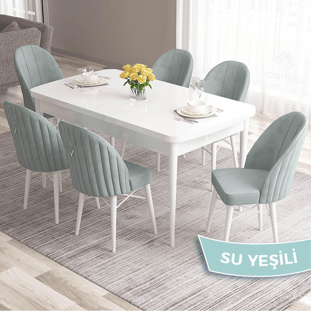 masa beyaz sandalye su yeşili ayaklar beyaz