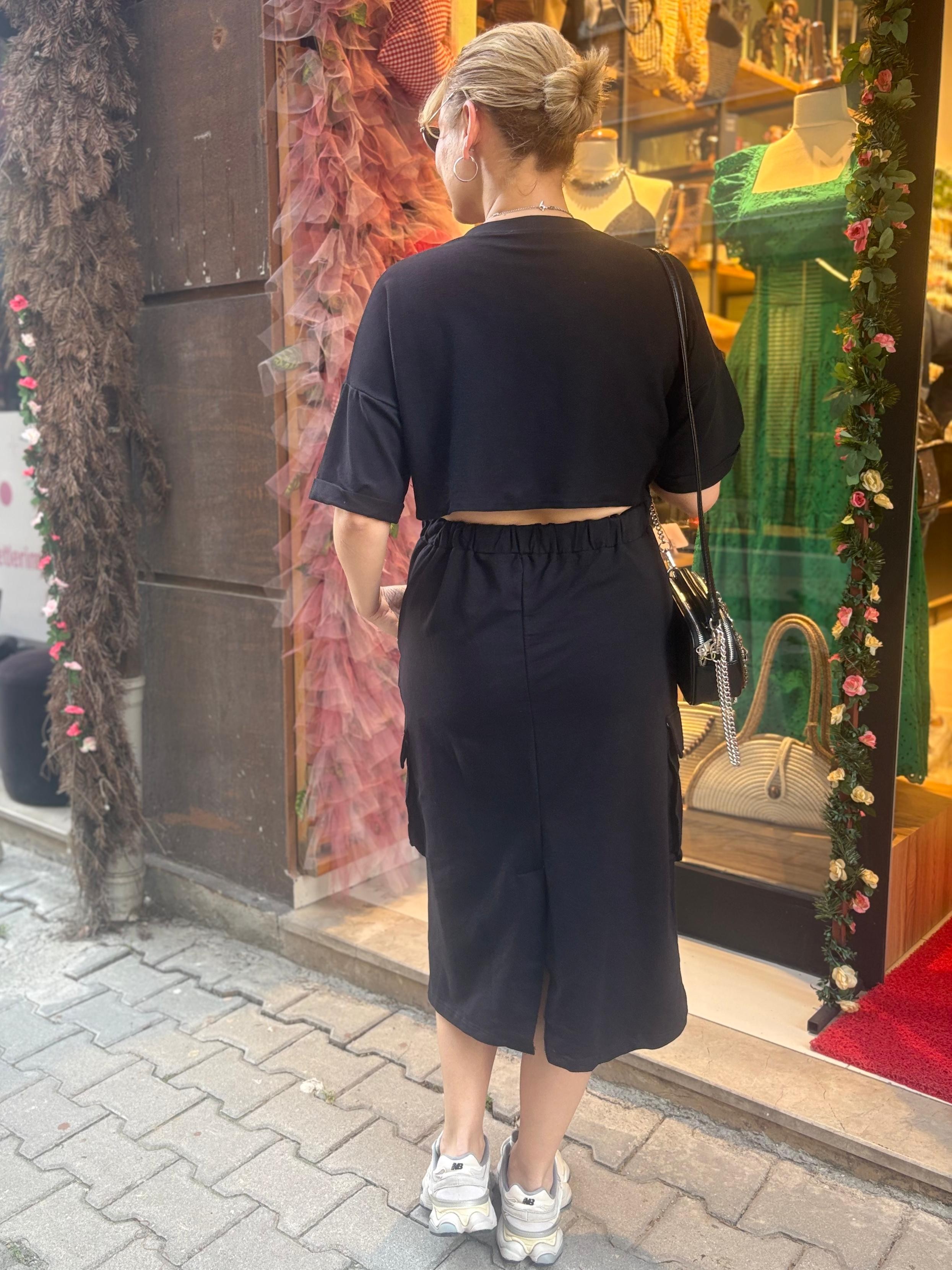 Twst model arkası pencere detaylı elbise
